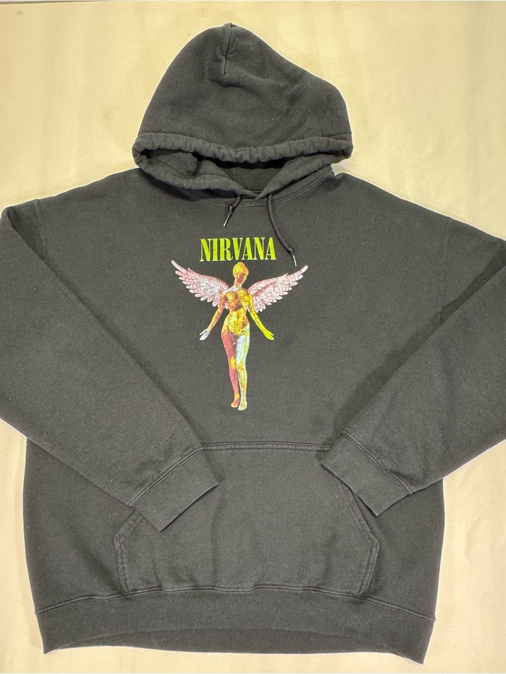 NIRVANA Black Crewneck Hoodie with Yellow-Green Logo and Multicolor Angel